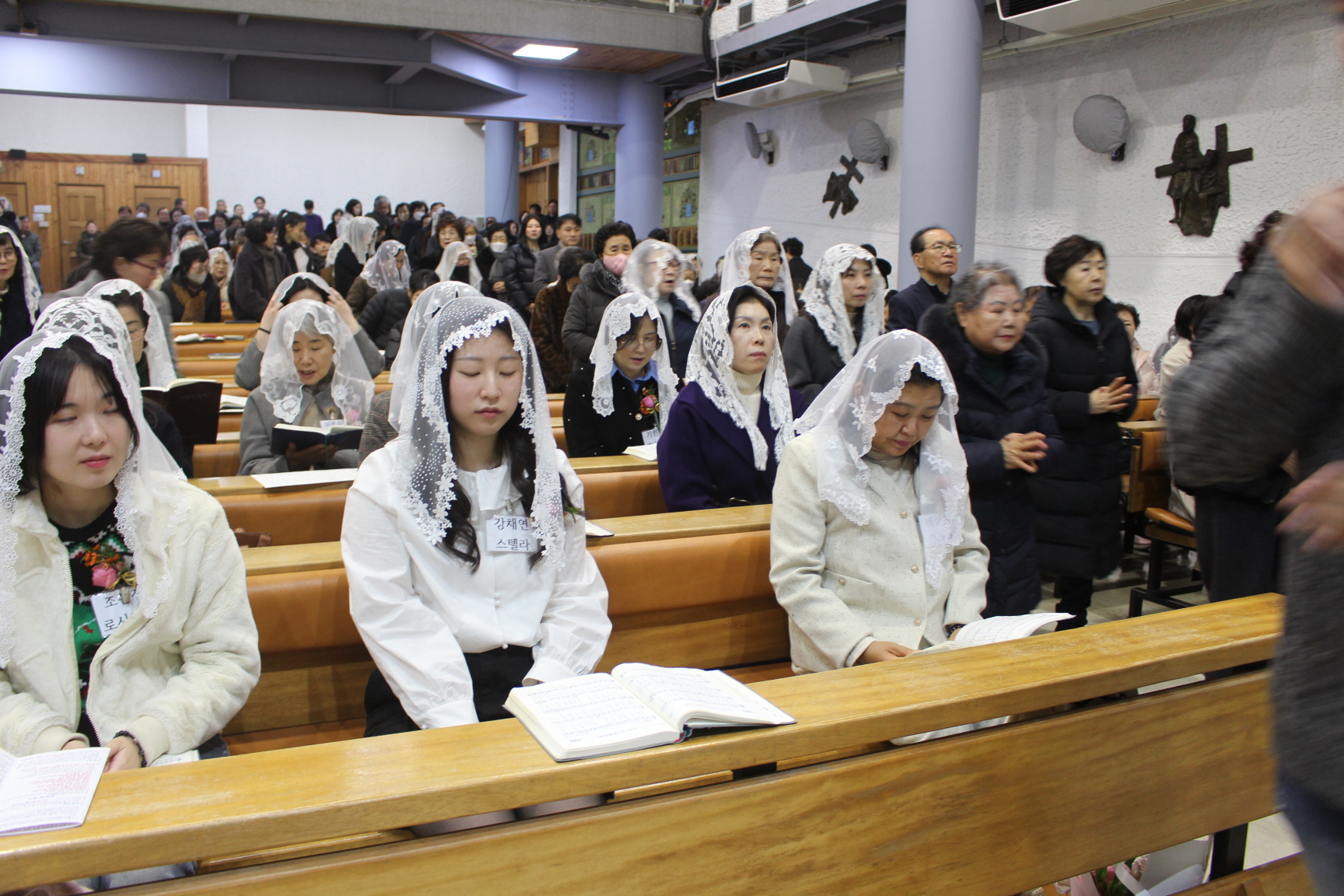 251225 성탄대축일 낮미사_세례자분들 (14).JPG