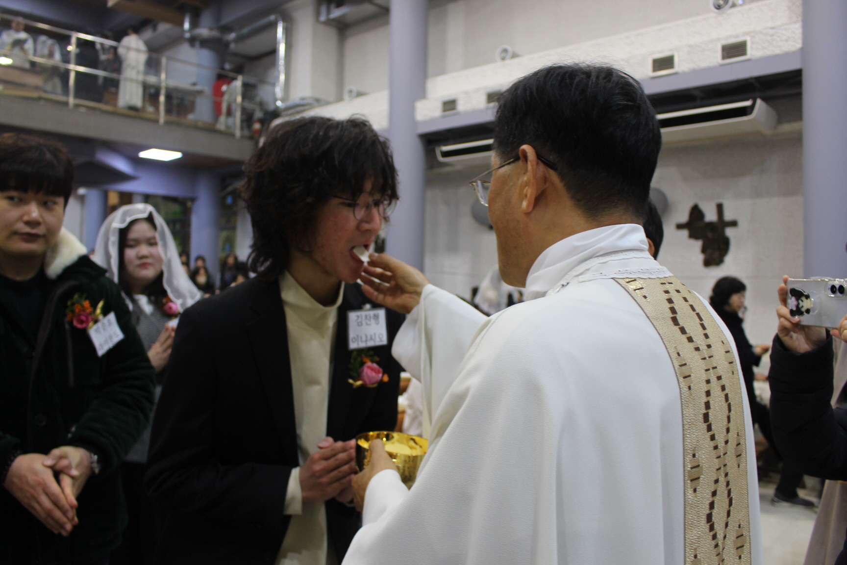 251225 성탄대축일 낮미사_첫영성체 (12).JPG