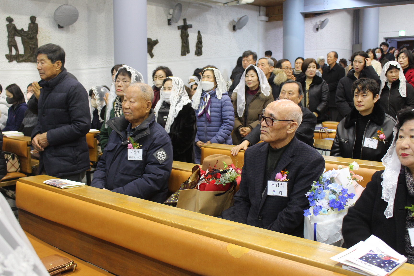 251225 성탄대축일 낮미사_세례자분들 (15).JPG