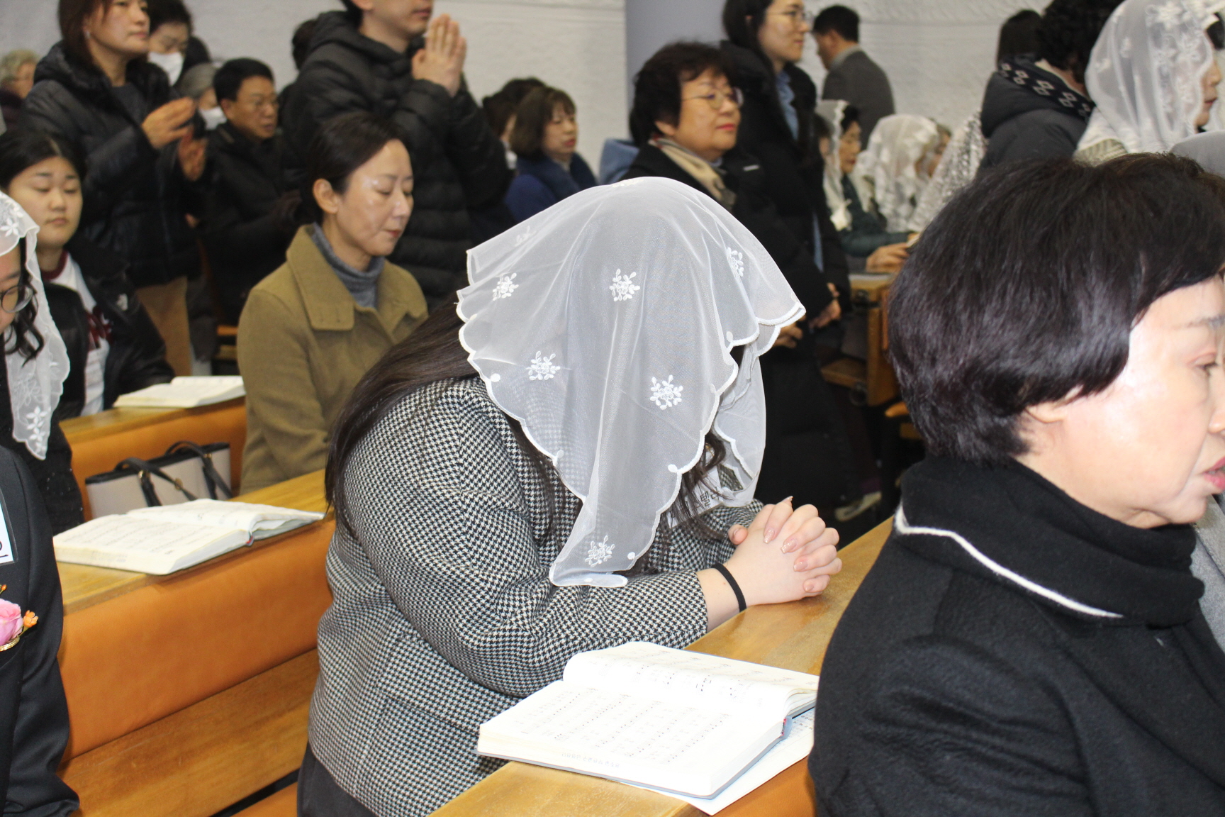 251225 성탄대축일 낮미사_세례자분들 (1).JPG